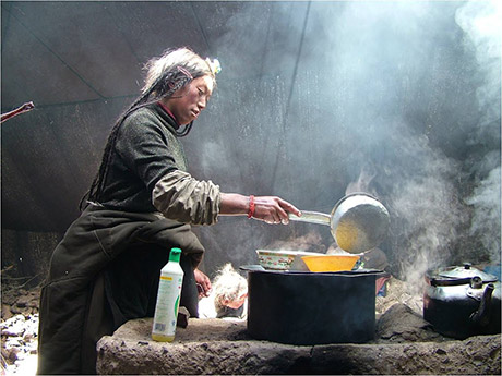 Cooking in a Tibetan nomad tent